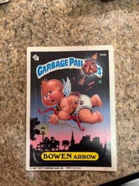 Garbage Pail Kids 'Bowen Arrow' Collectible Card - Black & Pink